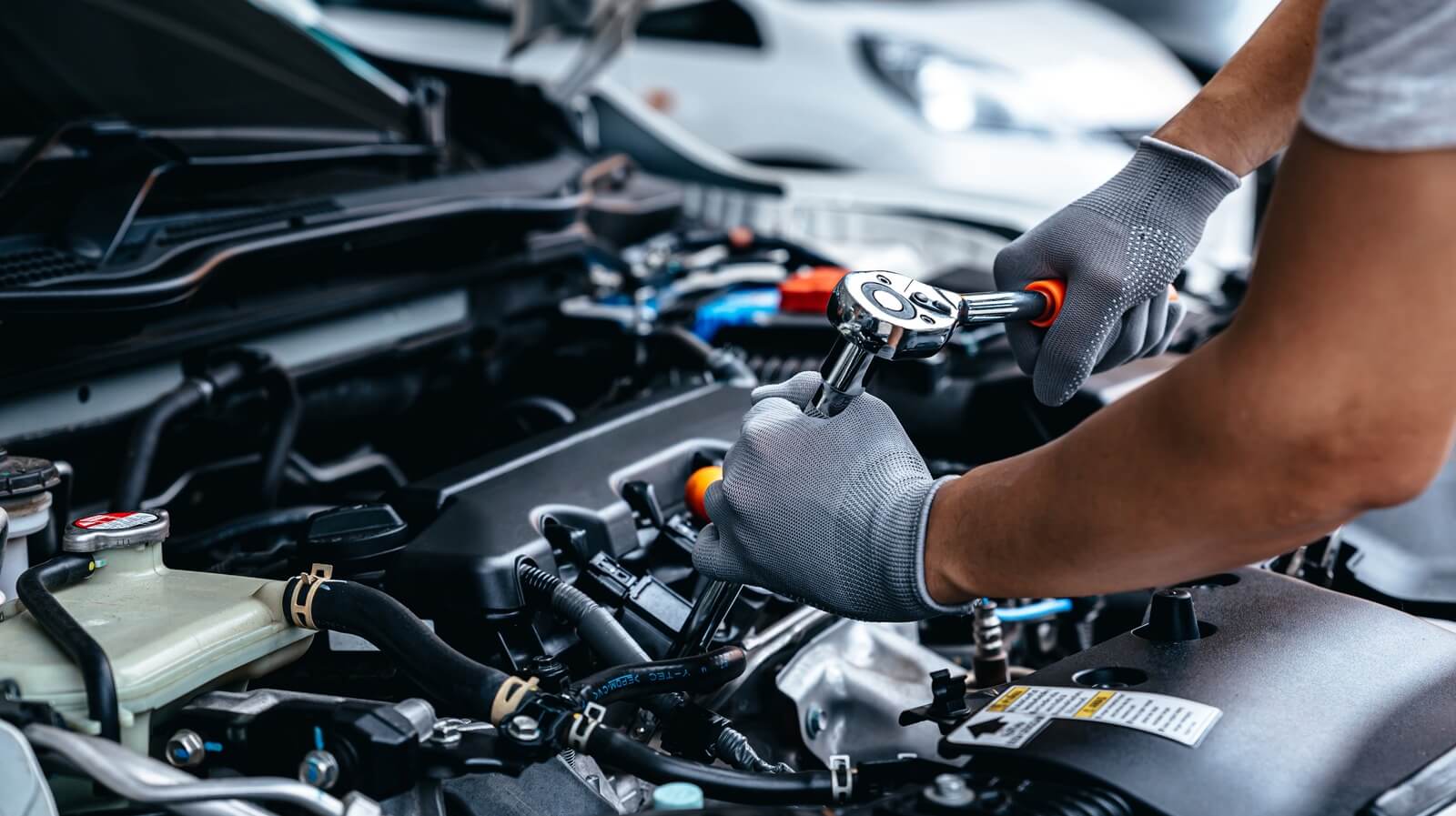 car mechanic repair battery on the car